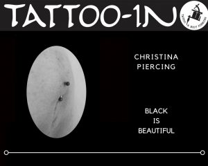 Christina-Piercing mit schwarzen Kugeln